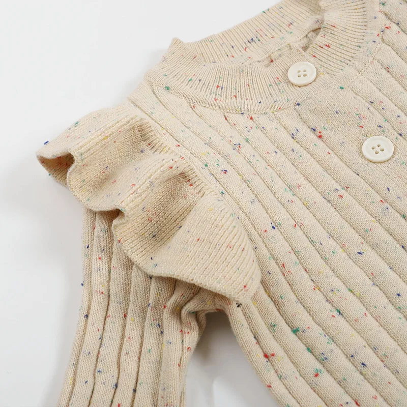 MiniAurora – Zacht & Elegant – Gebreide babypakje met engelenvleugels en hoofdband