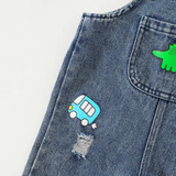 DinoDenim – Stoer & Speels – Kinder Tuinbroek met Cartoonprints