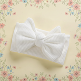 MiniAurora – Zacht & Elegant – Gebreide babypakje met engelenvleugels en hoofdband
