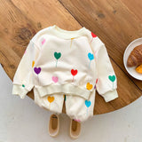 Mini Fashion™ - Superzacht & Comfortabel - Gekleurde hartjes trainingspak